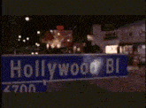 a sign that says directed by garry marshall in front of a store