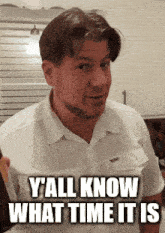 a man in a white shirt with the words y'all know what time it is