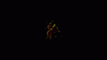 a yellow teddy bear is standing in the dark in a dark room .