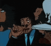 a man in a suit and tie making a funny face
