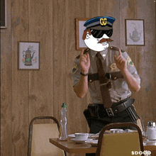 a cartoon of a police officer giving a thumbs up with gg on his hat