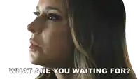 a woman says what are you waiting for in front of a white background