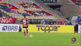 a soccer player with the number 19 on his shirt