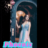 a woman in a blue and pink dress is standing in front of a door with the word phoenix on the bottom