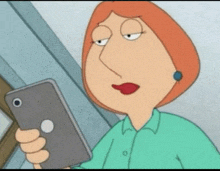 lois griffin from family guy looks at her phone