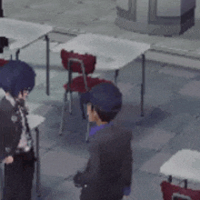 a group of people standing around tables and chairs in a classroom .