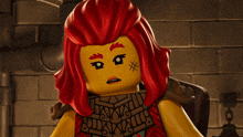 a lego figure with red hair and a x on his face