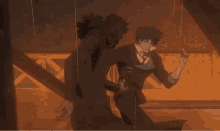 a man in a suit is kicking another man in a room
