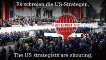a large group of people marching in front of a sign that says vereinigt euc
