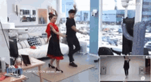 a man and a woman are dancing together in a living room .