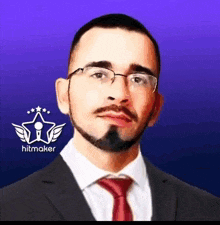 a man in a suit and tie with a logo for hitmaker