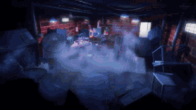 a dark room with smoke coming out of it and a tv screen behind it that says tokyo