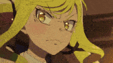 a close up of a yellow haired anime character