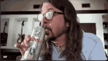 Dave Grohl GIF - Dave Grohl Drinking GIFs