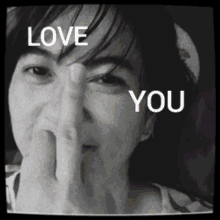a black and white photo of a woman with the words love you written above her