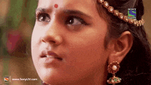 a close up of a woman 's face with the words sony television on the bottom right