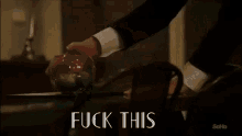 a blurry picture of a person with the words " fuck this " written on the bottom