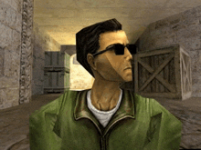 a man wearing sunglasses and a green jacket is in a hallway