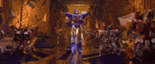 a blurry picture of a group of robots in a room .