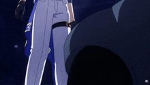 a person wearing white pants with the letter v on the side