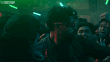 a man on a motorcycle is surrounded by zombies and the year 2005 is on the bottom of the screen