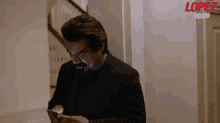 George Texting GIF - George Lopez Texting Mobile Phone GIFs