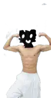a shirtless man is flexing his muscles with a smiley face drawn on his face