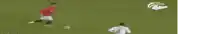 a blurry picture of soccer players on a field with the number 5 on their shorts