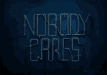 a neon sign that reads nobody cares