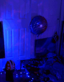 a congratulations balloon hangs on a wall above a bed