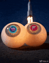 two glowing eyes with a whale and a rocket in the background