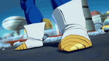 a close up of a cartoon character 's foot with a yellow sole