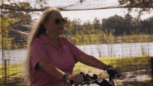 Riding A Bike Carole Baskin GIF - Riding A Bike Carole Baskin Tiger King2 GIFs