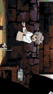 a cartoon of a boy laying on the ground with tiktok written on the bottom