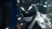 a close up of a person in a batman costume