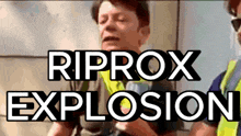 a man in a yellow vest is standing next to a sign that says " riprox explosion "