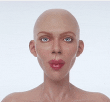 a woman with a bald head and red lips looks at the camera