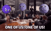 a group of people sitting around a table with one of them saying one of us one of us