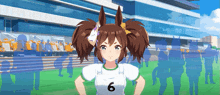 a girl with the number 6 on her shirt stands in front of a crowd