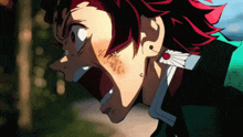 a close up of a person 's face with their mouth open and red hair