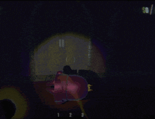 a person is holding a flashlight in a dark room with numbers 1 2 and 3 on the floor