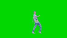a person is dancing on a green screen .