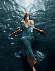 Lady Laying Down Water GIF
