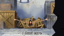 monkey d luffy is sitting on a pile of wooden boxes and says i dont care