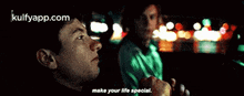 two men are sitting in a car and one of them is saying make your life special .