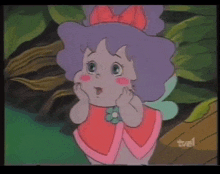 a cartoon of a little girl with a bow on her head is on tvel channel