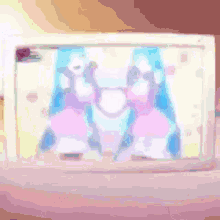 a picture frame with a picture of a couple of girls on it