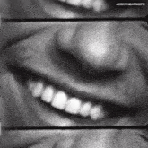 a black and white photo of a woman 's mouth with the words josephquinngifs below it