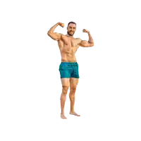a shirtless man in blue swim shorts flexes his muscles