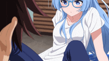 a girl with blue hair and glasses is sitting next to a boy